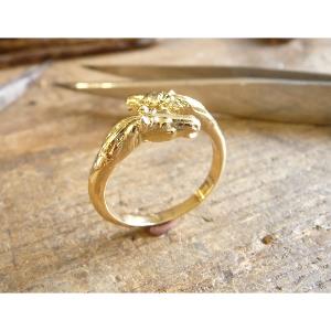 Bague or 18 KT avec tête de chevaux