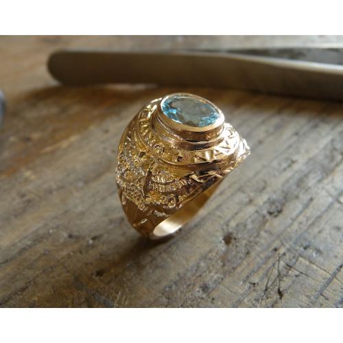 Bague américaine en or 9 KT et aigue marine