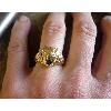 Bague or jaune 9 KT tête de lion Nargal avec saphir